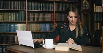 Law student working in a library